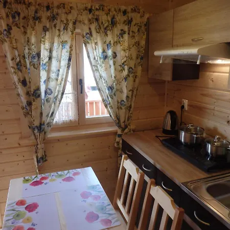 Деревянный коттедж Sloneczna Osada Устроне-Морске